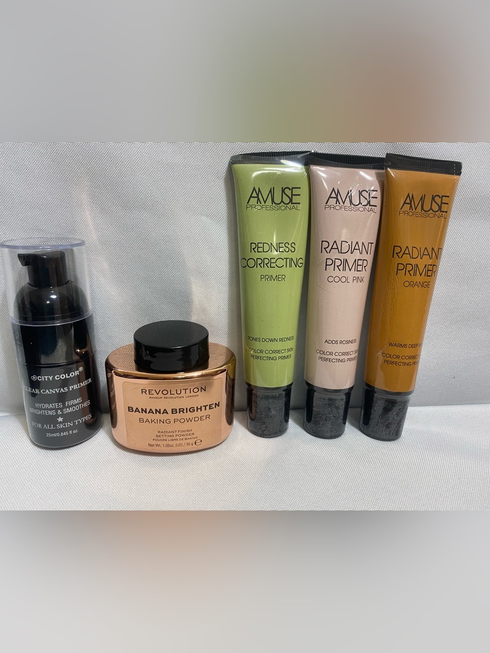Flawless Base Essentials Makeup Bundle, PRIMERS AND BAKING POWDER.